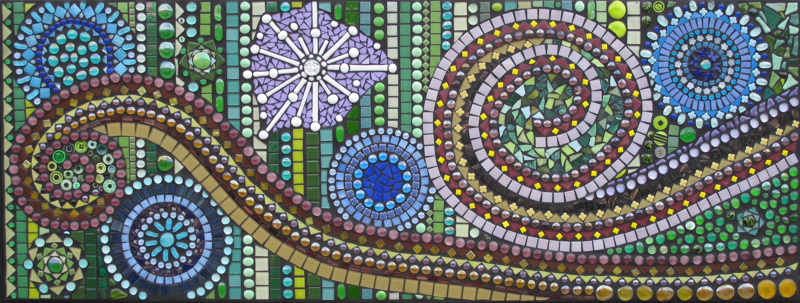 A glass tile mosaic of circles and spirals.