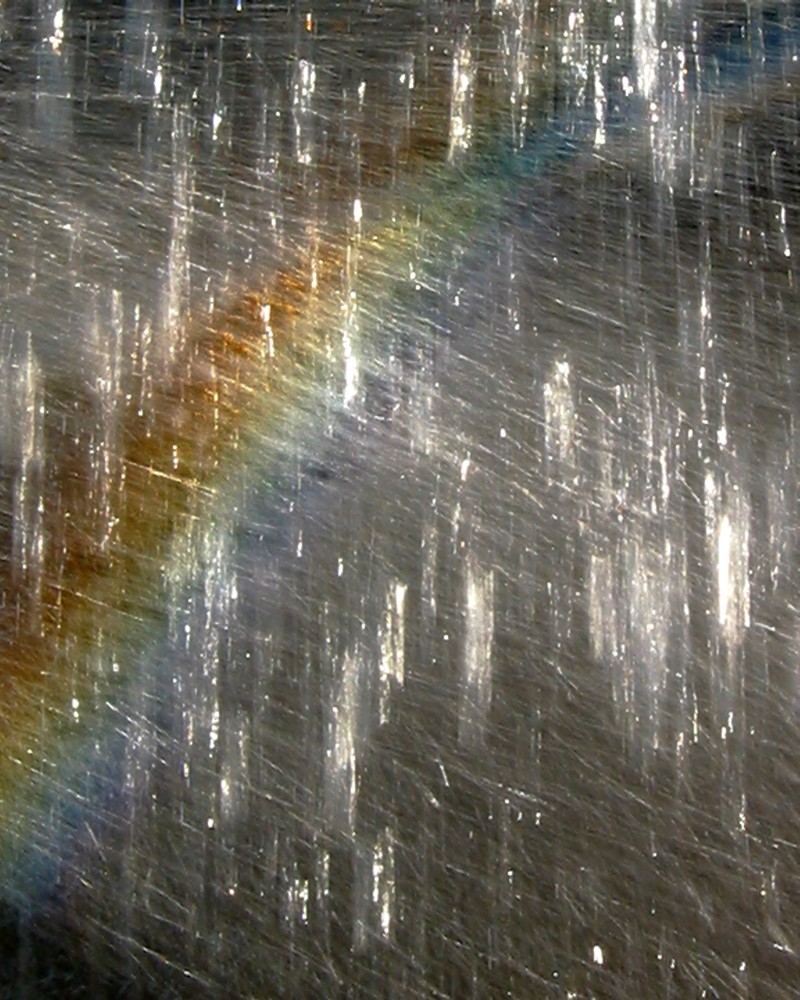 Falling water creating a rainbow.