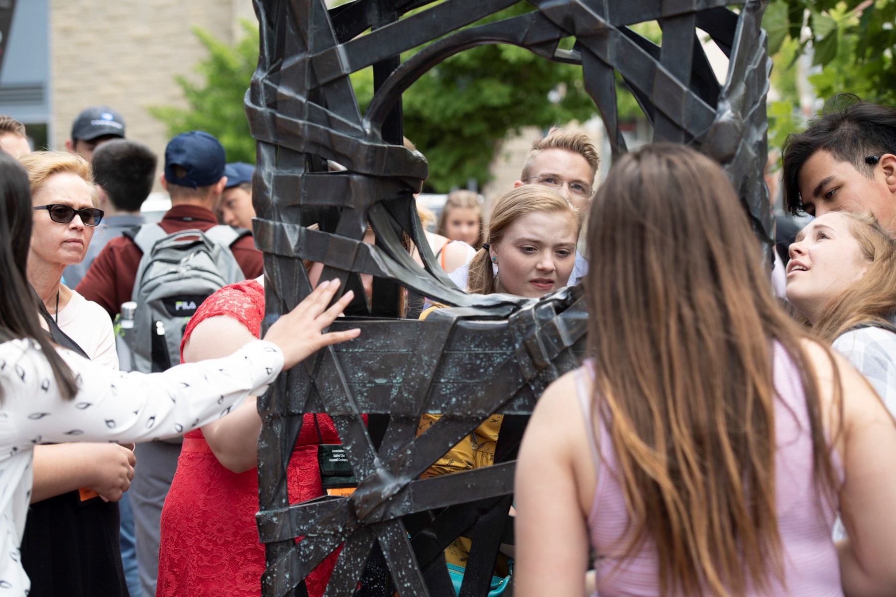 Tour participants gather around "Portal" (2002) by Francis Fox in BoDo in downtown Boise; Photo courtesy of Boise State University (2019)