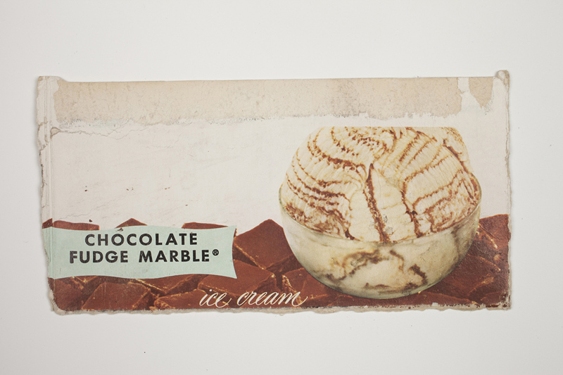 A piece of cardboard from a printed "Chocolate Fudge Marble" ice cream box.