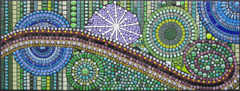 A glass tile mosaic of circles and spirals.