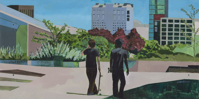 Two figures carrying skateboards near Rhode's Skate Park in downtown Boise.