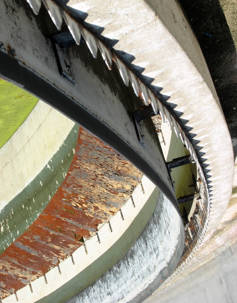 A flipped abstracted image of a curved waste water separator.