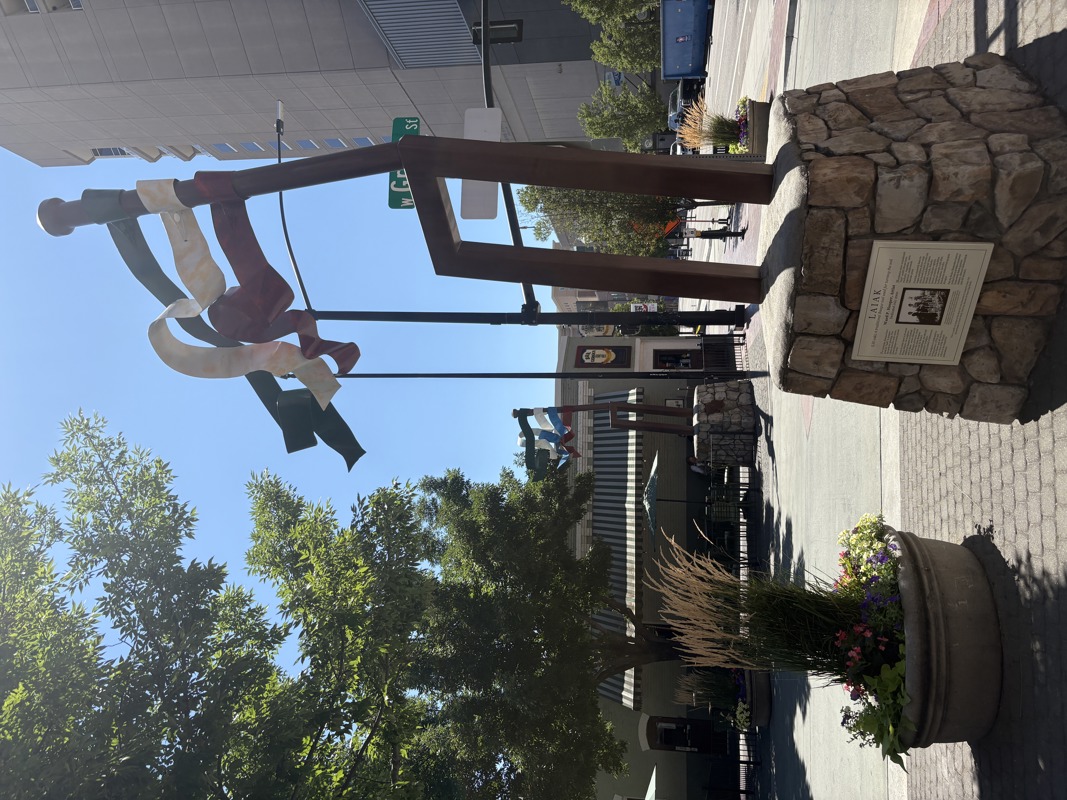 Two large sculptures of laiak (Basque farming tools) that flank the entrance to Boise's Basque Block on Grove St.